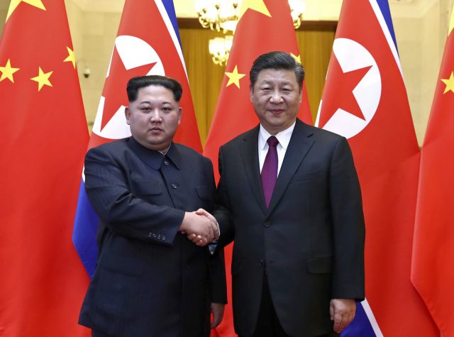 Xi Jingping,Kim Jong Un